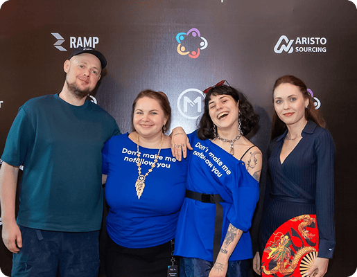 Group photo of four Collaborator team members posing together at SEO Mastery Summit 2025